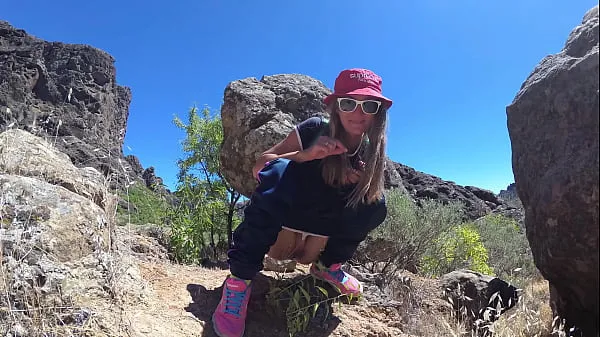 Új PISS PISS TRAVEL - Young girl tourist peeing in the mountains Gran Canaria. Public Canarias mega cső